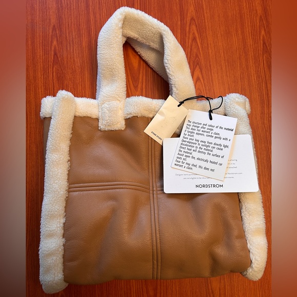 Stand Studio Medium Lolita
Faux Shearling & Faux Leather Tote - Picture 2 of 14